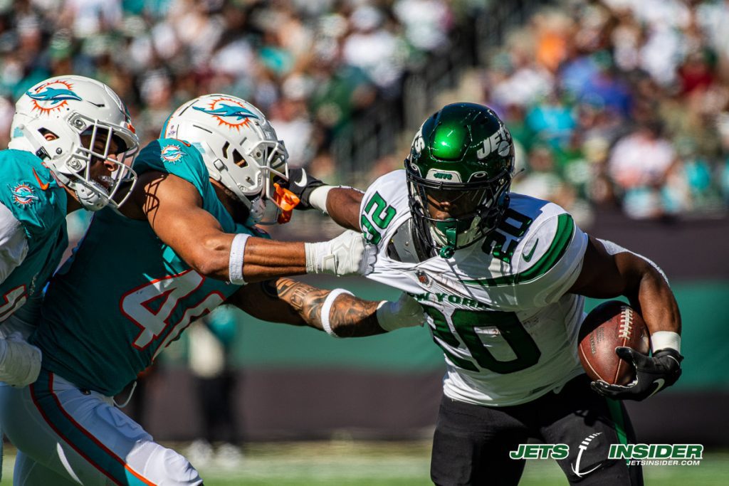 Breece Hall Dolphins stiff arm 1 - Jets Insider